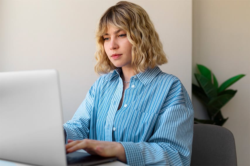 Woman working on laptop