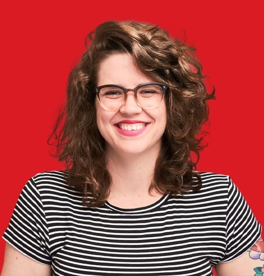 A headshot of Melissa Rutherford in a red background