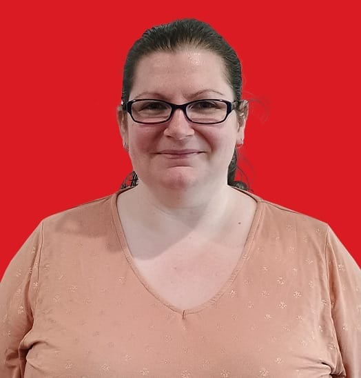 A headshot of Nicole Clinch in a red background
