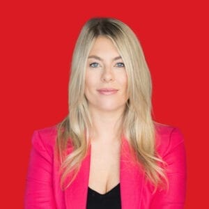 A headshot of Gemma Lloyd in a red background