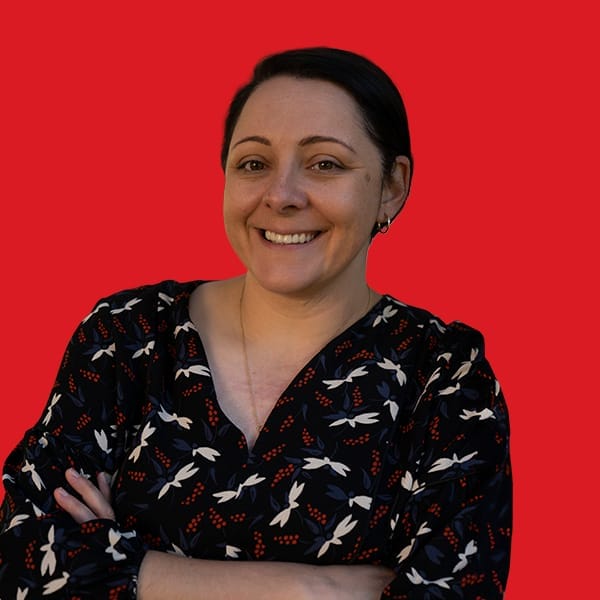 A headshot of Jessica Bulger in a red background