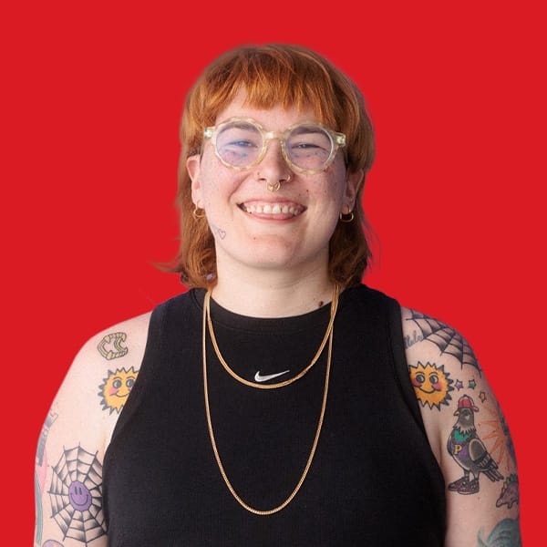 A headshot of Sonny Jane Wise in a red background
