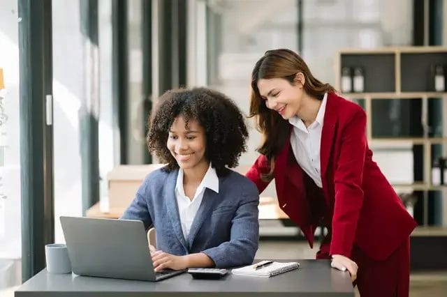 Two business woman discussing mentoring