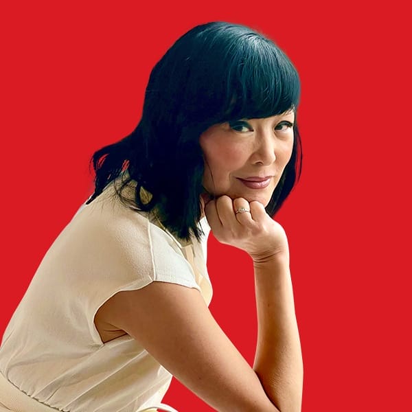 A headshot of Liz Lor in a red background
