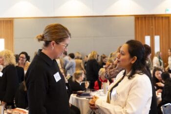 One of the Melbourne Symposium speakers having a conversation