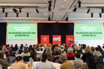 One of the Melbourne Symposium speakers talking on stage