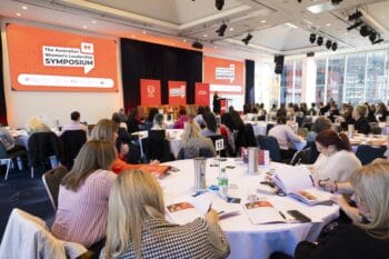 A wide shot of the room at the Melbourne Symposium event