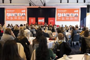 Our speakers having a panel discussion on stage at the Melbourne Symposium